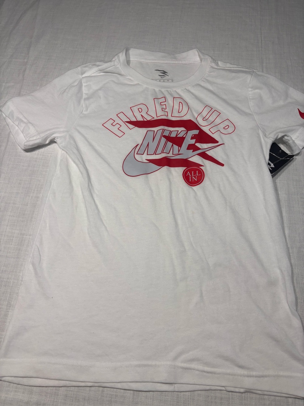 Nike White Tee with Red 'Fired Up' Graphic